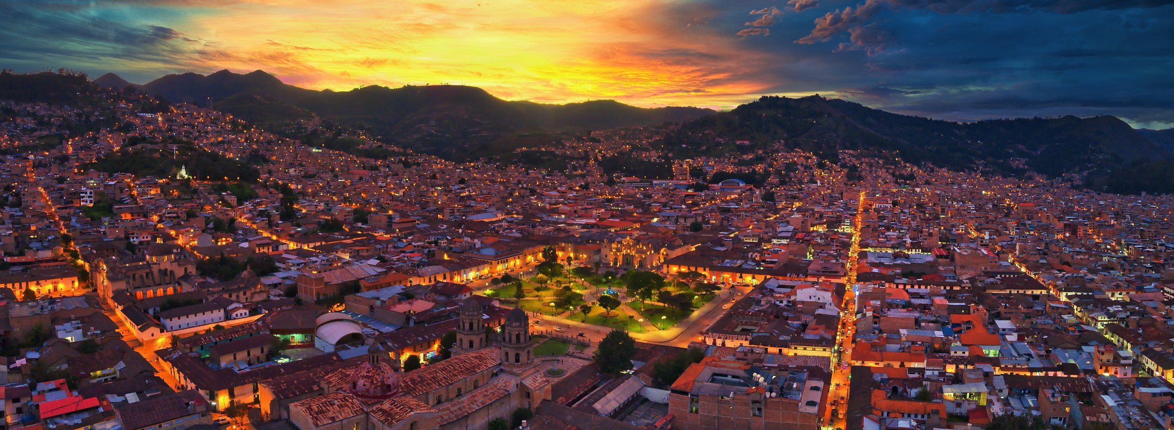 Cajamarca spread across its valley at sunset